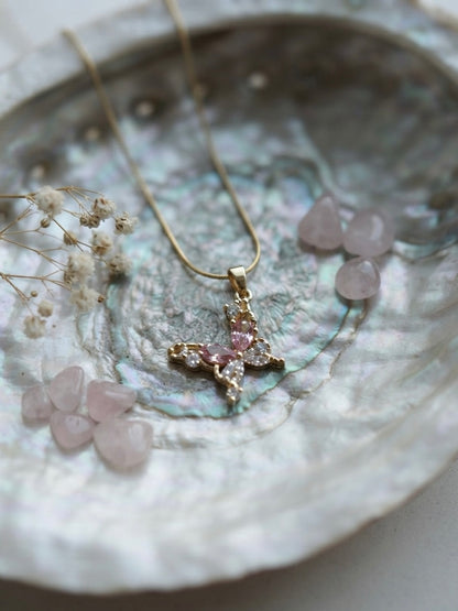 Delicate gold butterfly crystal necklace.