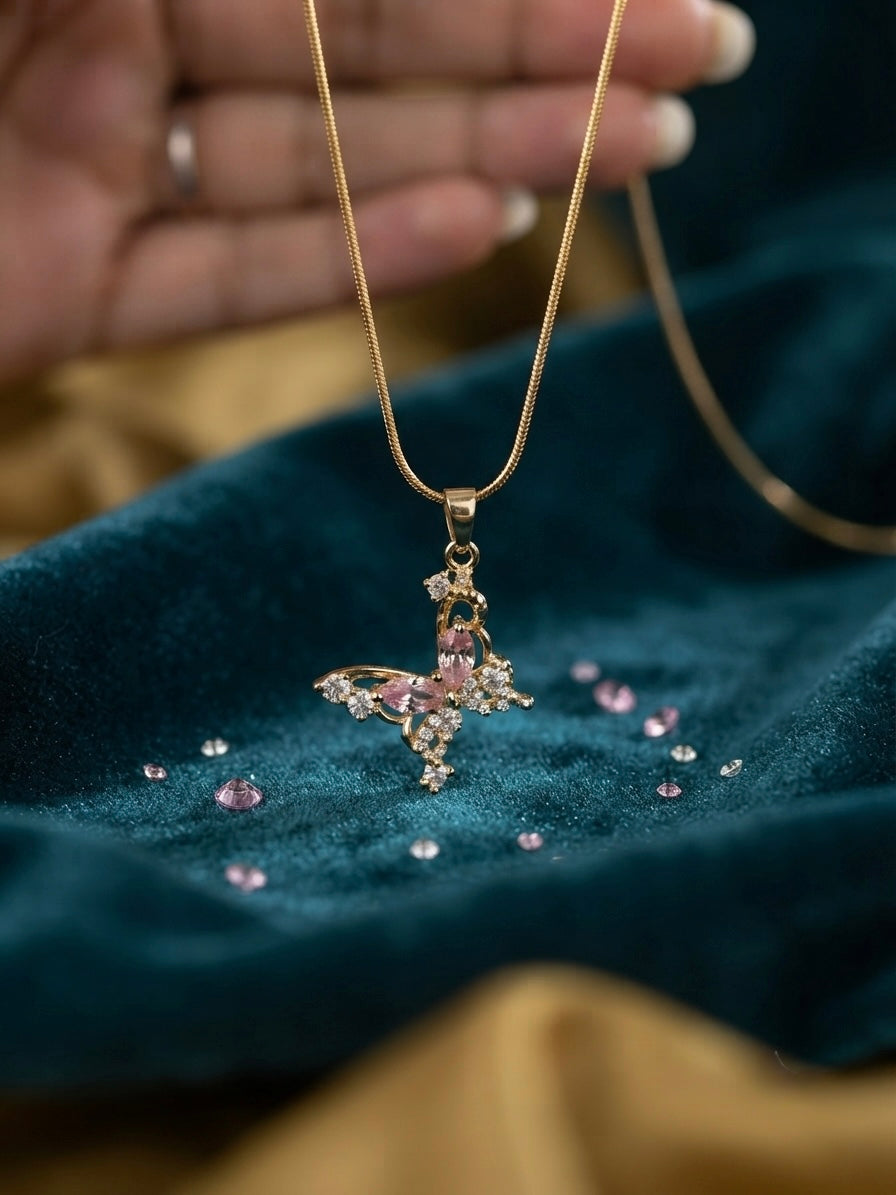 Delicate gold butterfly crystal necklace.
