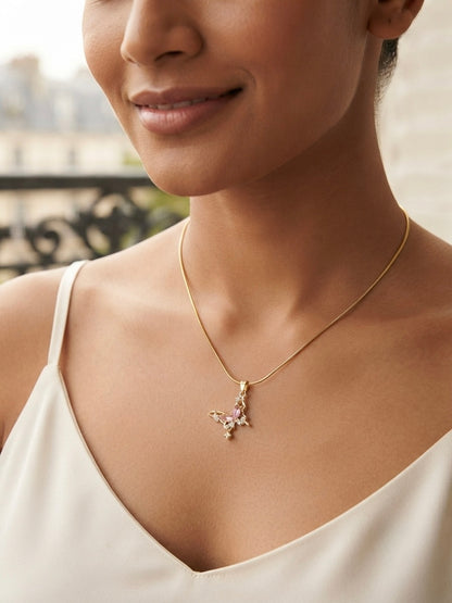Delicate gold butterfly crystal necklace.