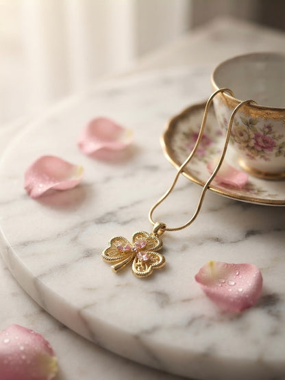 Elegant gold clover charm necklace.