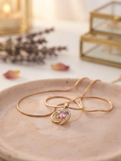 Charming heart design, sophisticated gold finish.