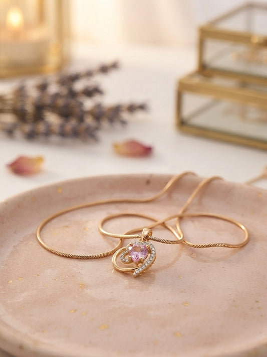 Charming heart design, sophisticated gold finish.