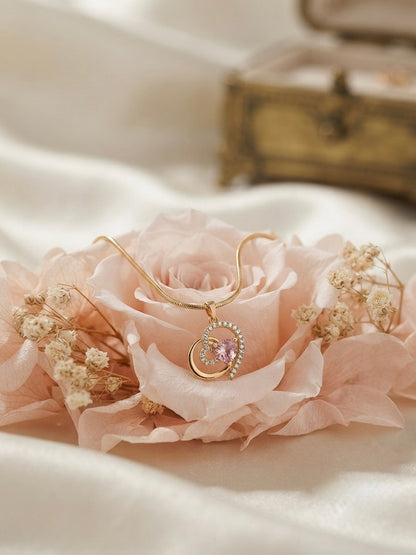 Charming heart design, sophisticated gold finish.