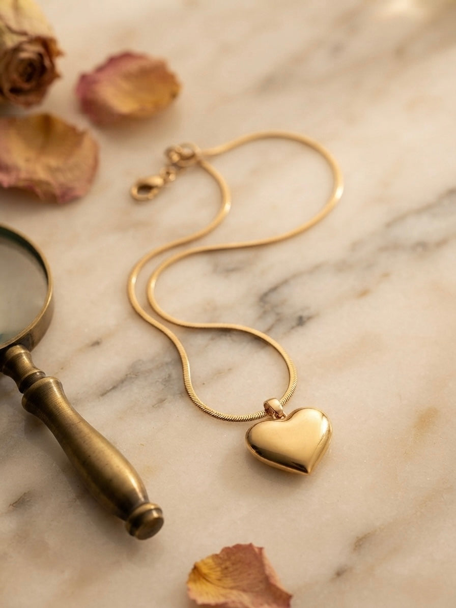 Classic polished heart, radiant gold necklace.