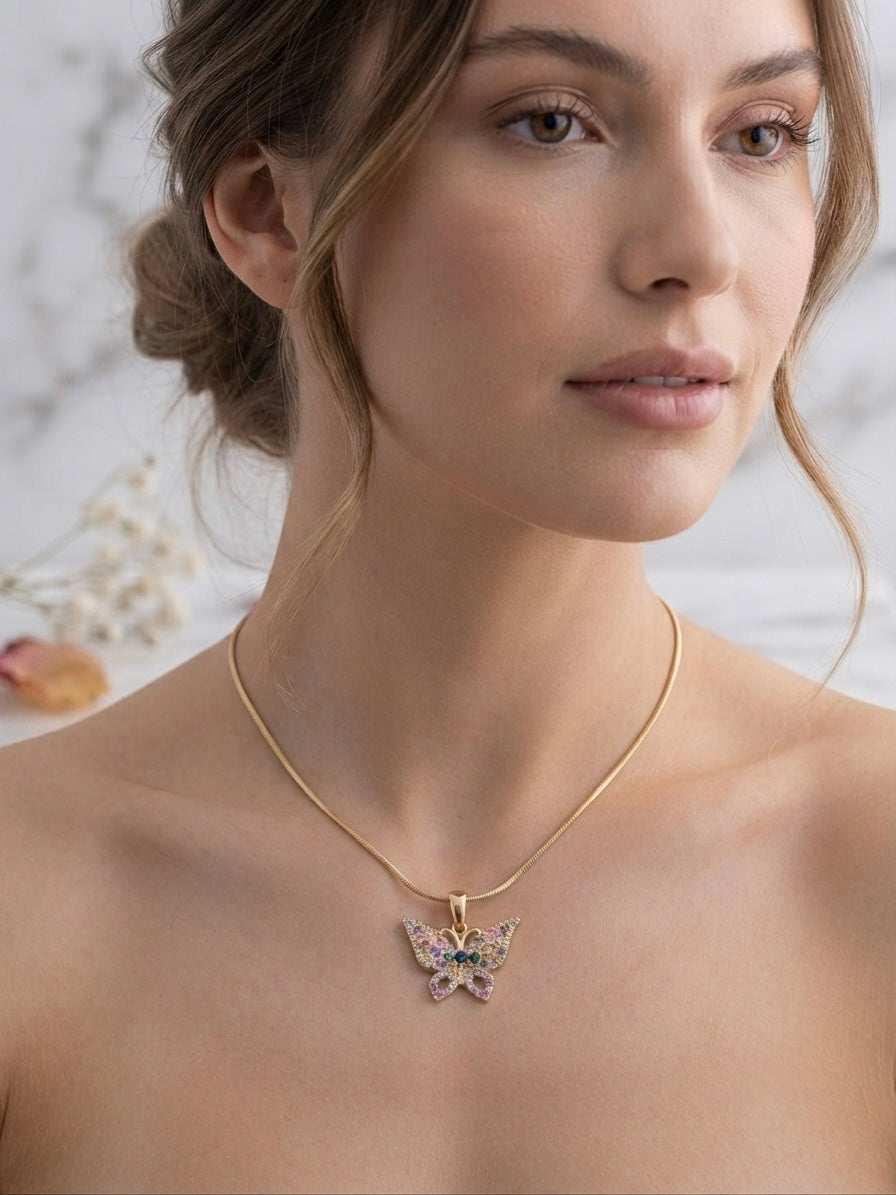 Sparkling multicolored stones, elegant gold charm.