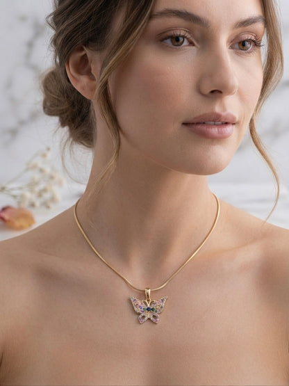 Sparkling multicolored stones, elegant gold charm.