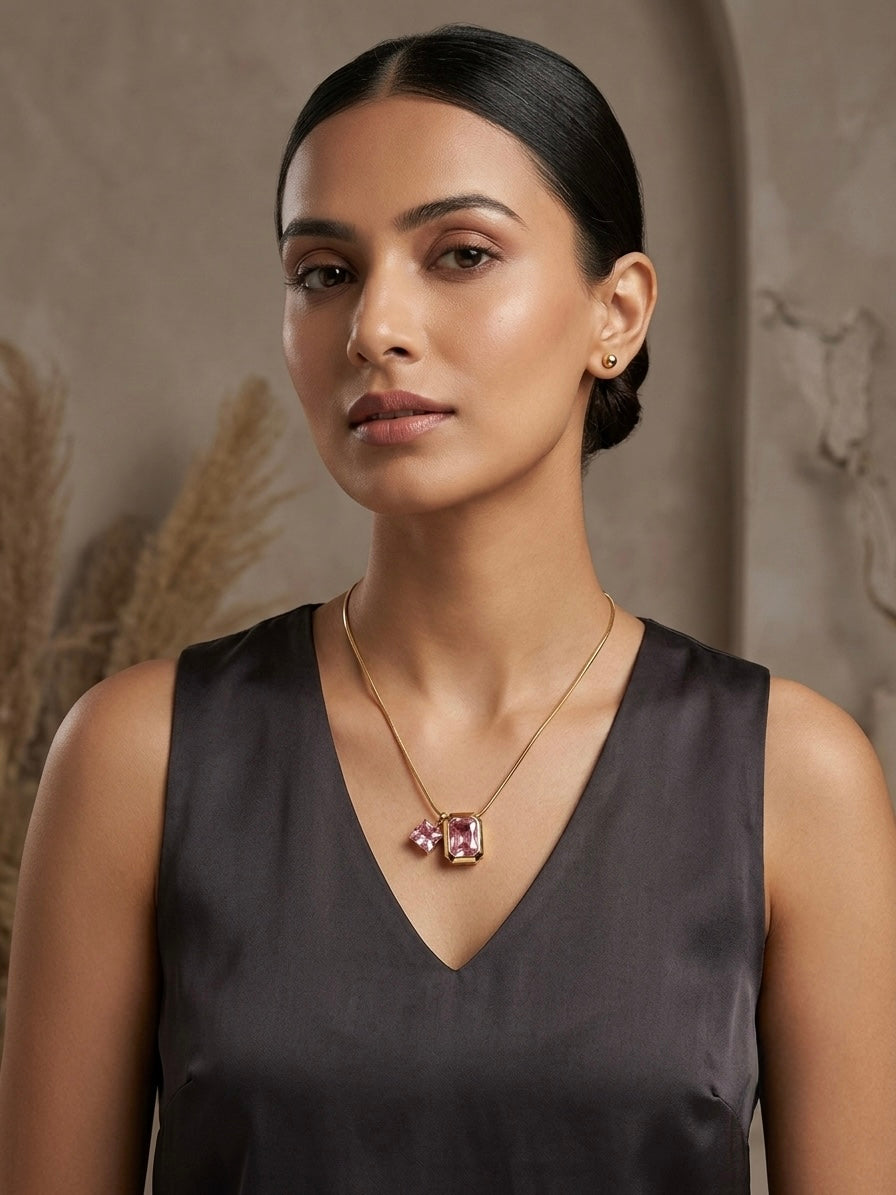 Chic double-gem design, timeless gold necklace.