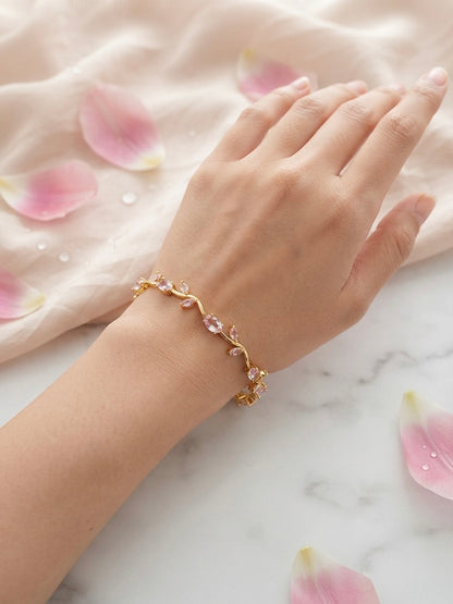 Radiant floral bracelet, timeless gold.