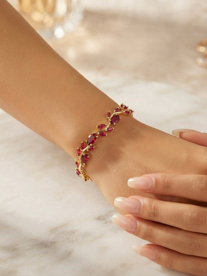 Radiant ruby-tone tulip bracelet, elegant.