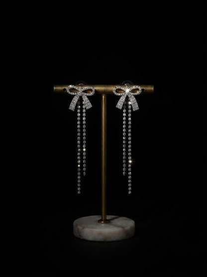 Elegant crystal bow drop statement earrings.