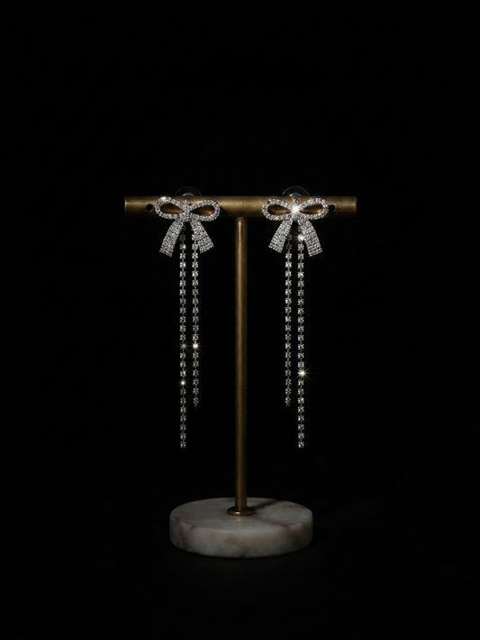 Elegant crystal bow drop statement earrings.
