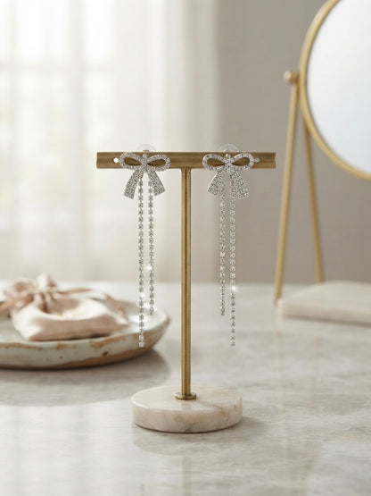 Elegant crystal bow drop statement earrings.