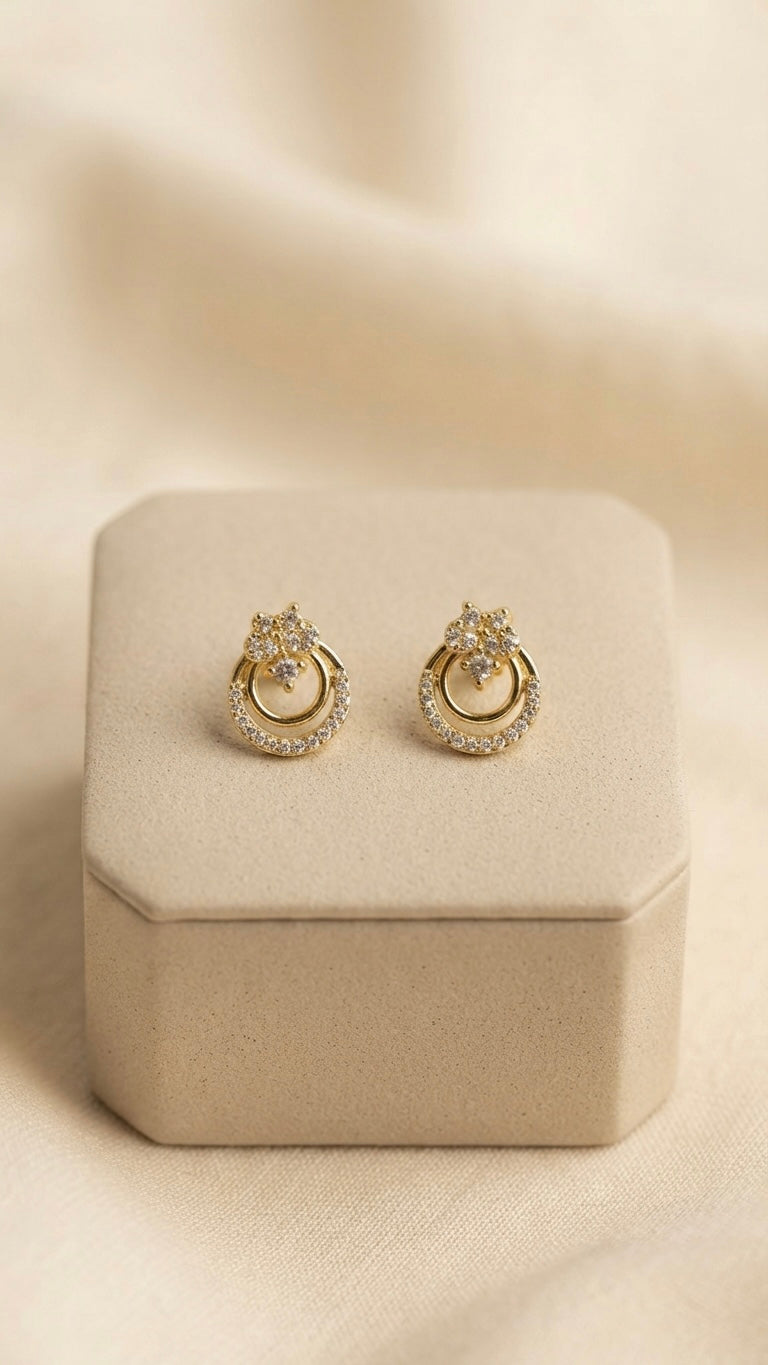 Radiant gold circle crystal stud earrings.
