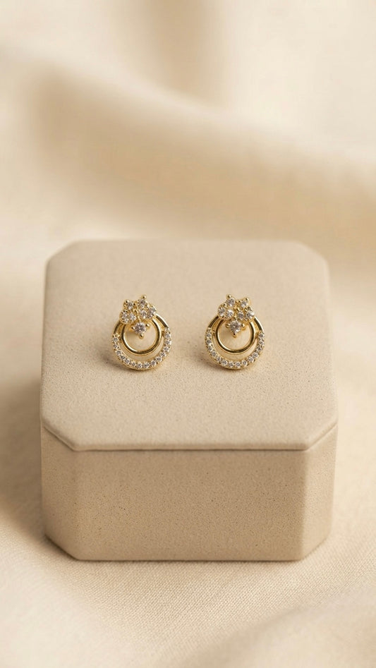 Radiant gold circle crystal stud earrings.