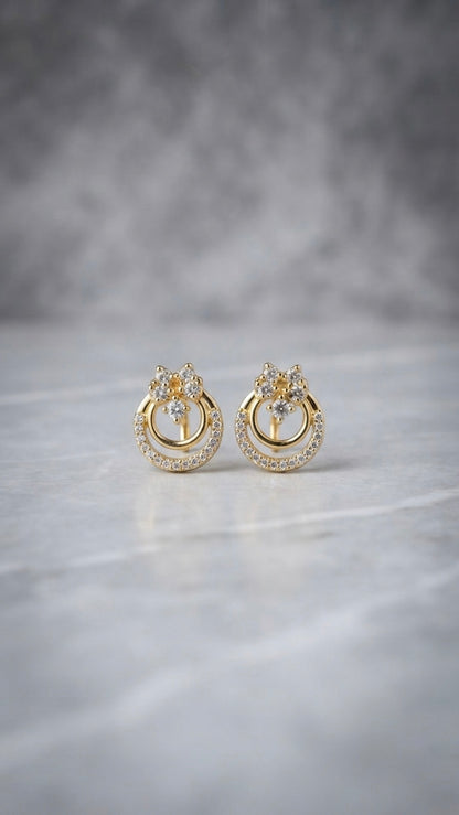 Radiant gold circle crystal stud earrings.