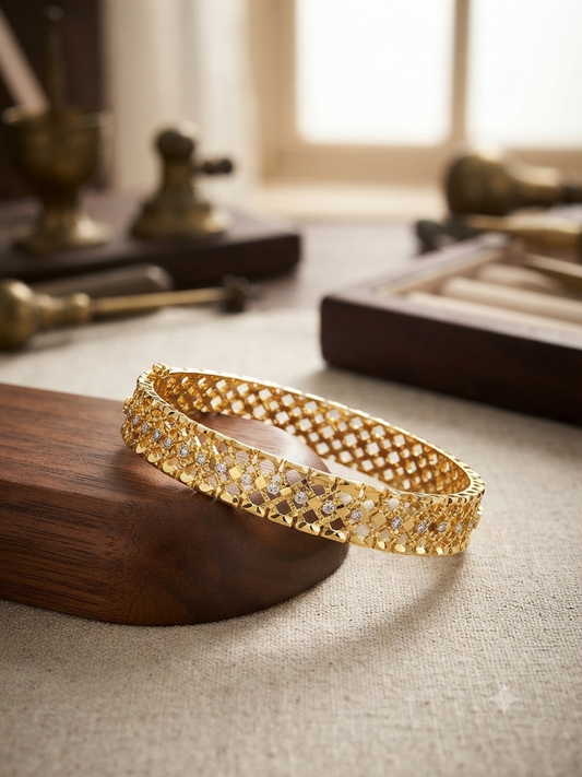 Elegant lattice gold diamond-studded bracelet.