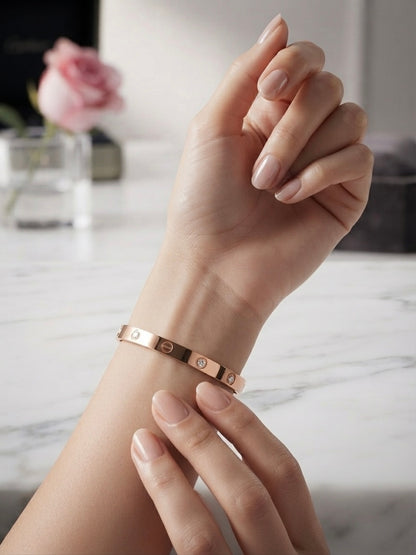 Elegant anti-tarnish screw-motif rose cuff bracelet.