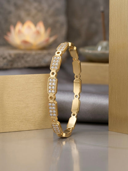 Elegant gold-plated diamond kada bracelet.