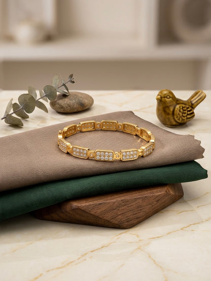 Elegant gold-plated diamond kada bracelet.