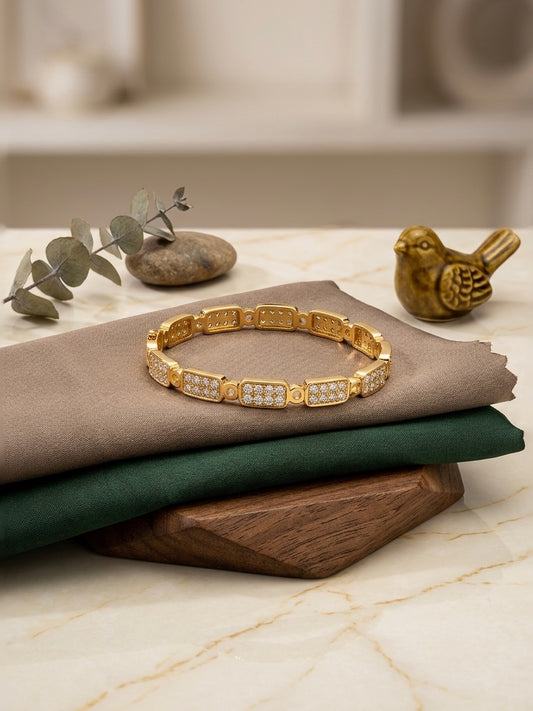 Elegant gold-plated diamond kada bracelet.