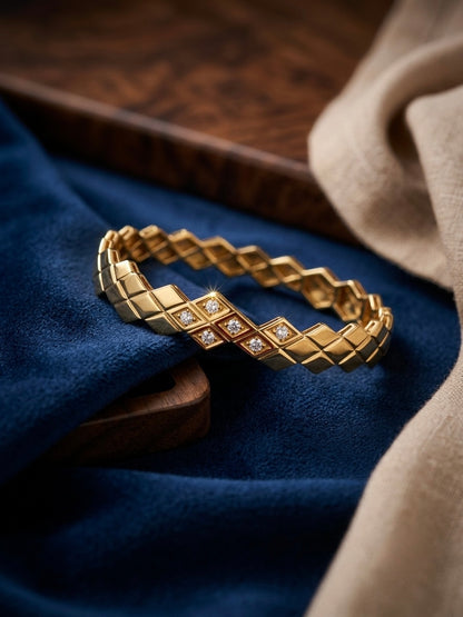Diamond-accented geometric gold kada bracelet.