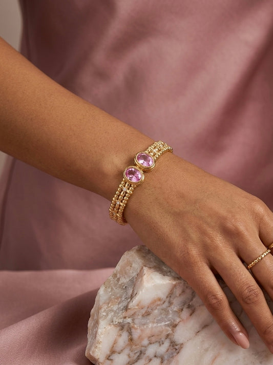 Luxurious beaded gold pink gemstone kada.