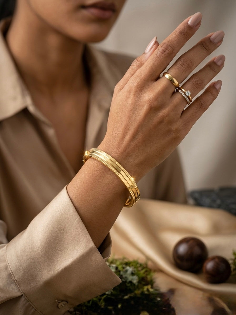 Sophisticated grooved gold statement kada.
