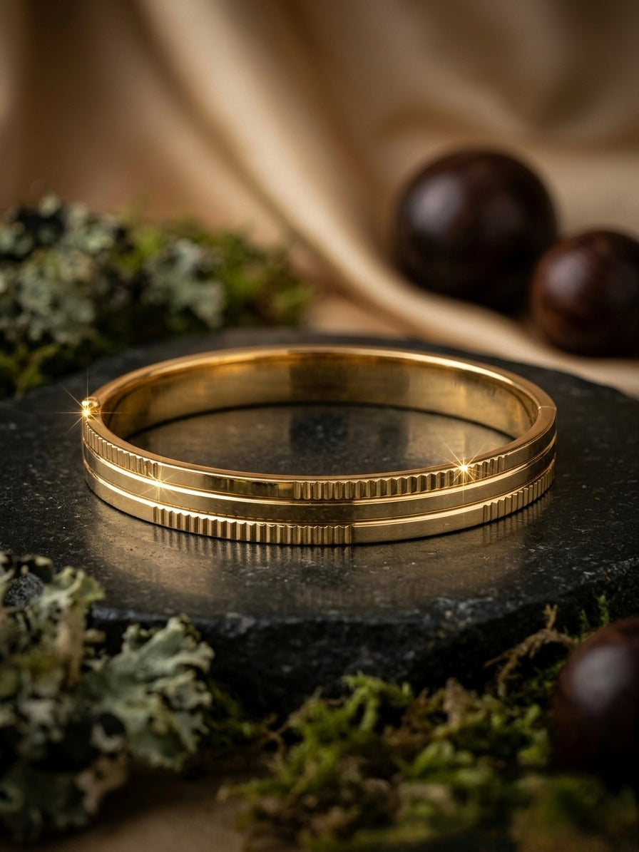 Sophisticated grooved gold statement kada.