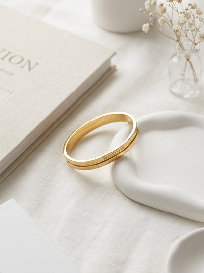 Sophisticated grooved gold statement kada.