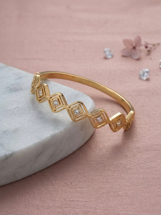 Sophisticated geometric stone gold bracelet.