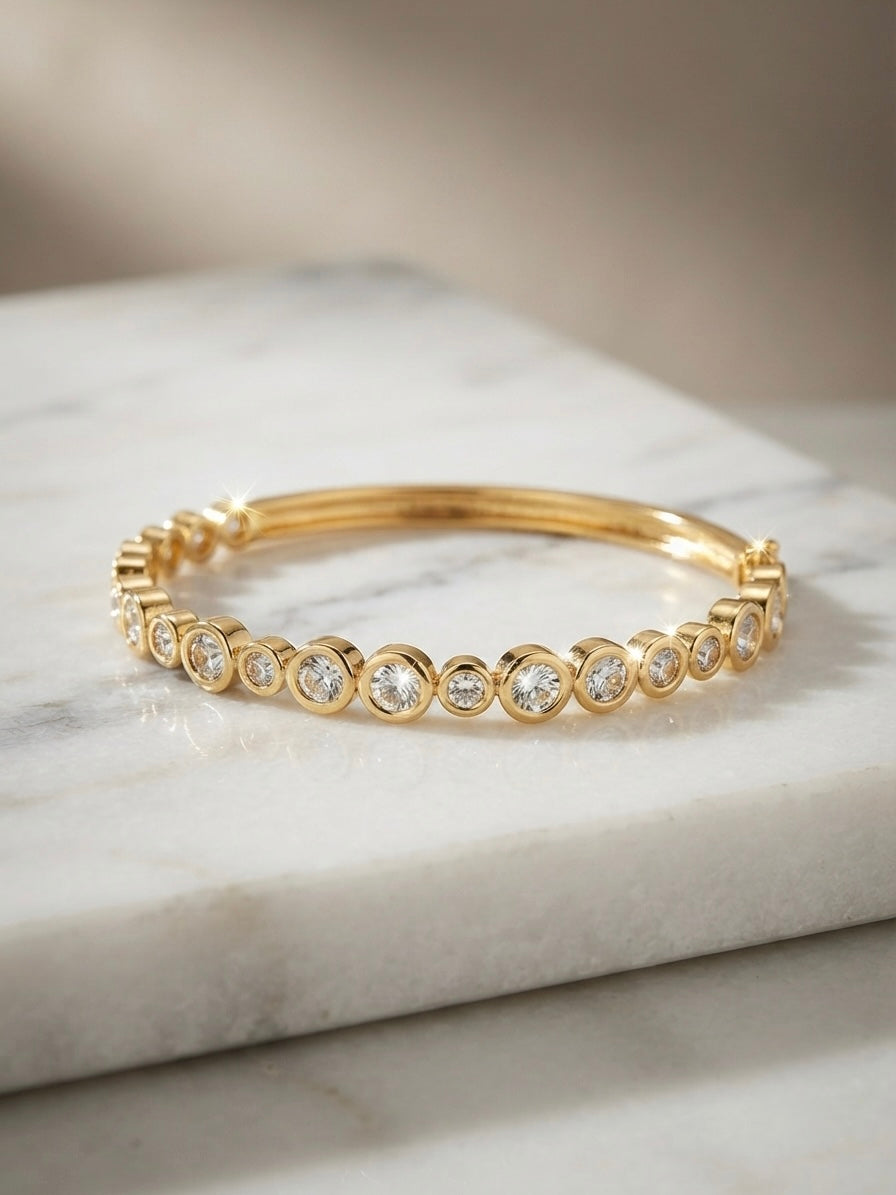 Radiant bezel-set crystal gold kada.