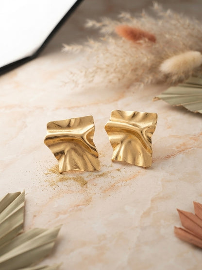 Sculpted gold anti-tarnish statement earrings.
