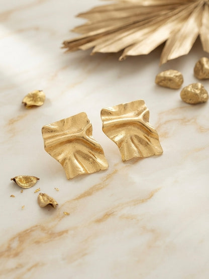 Sculpted gold anti-tarnish statement earrings.