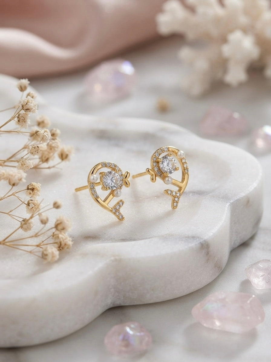 Dazzling dolphin pave and crystal earrings.