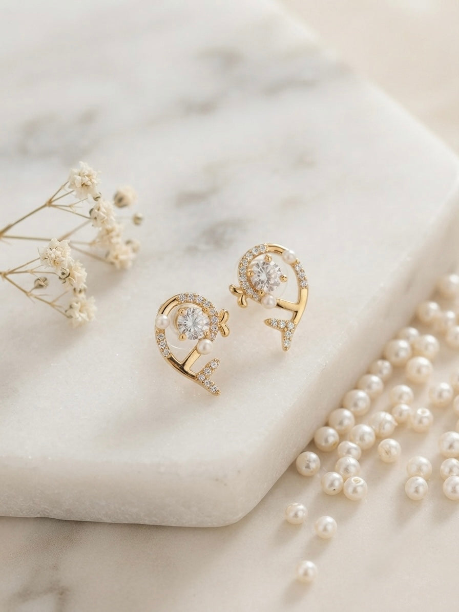 Dazzling dolphin pave and crystal earrings.