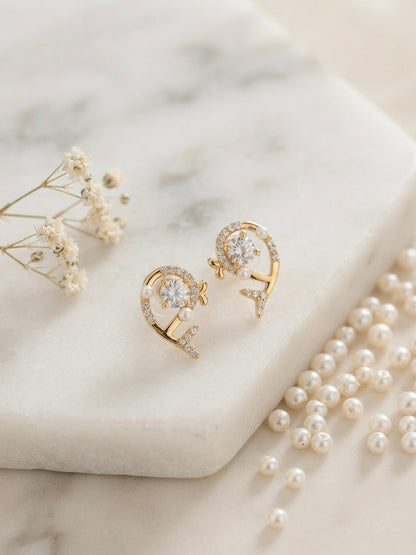 Dazzling dolphin pave and crystal earrings.