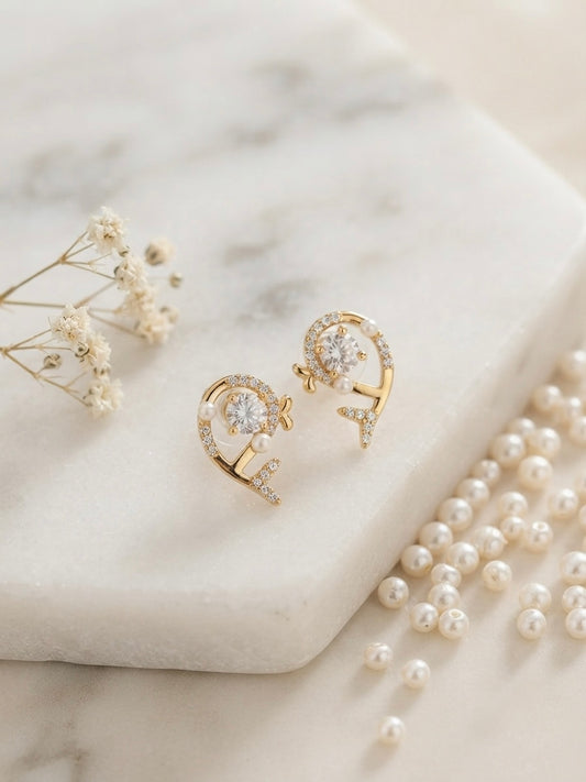 Dazzling dolphin pave and crystal earrings.