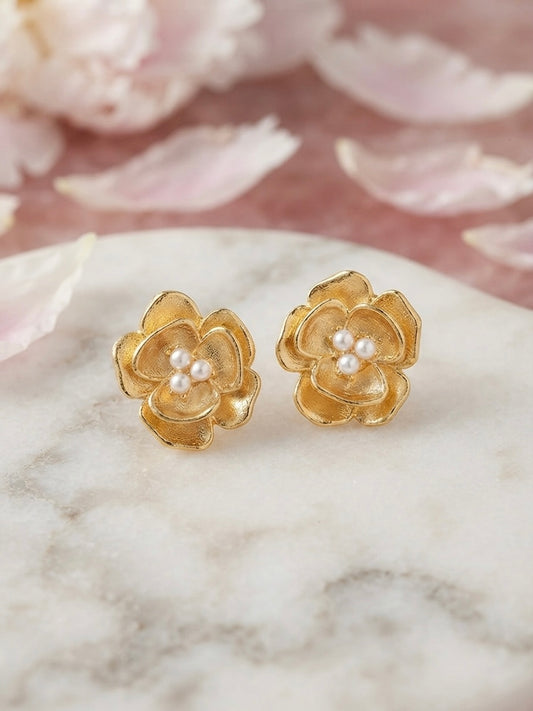 Sculpted blossom gold and pearl earrings.