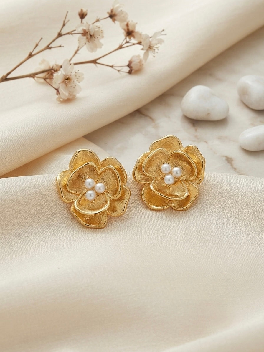 Sculpted blossom gold and pearl earrings.