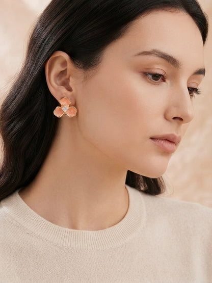 Pink enamel crystal flower stud earrings.