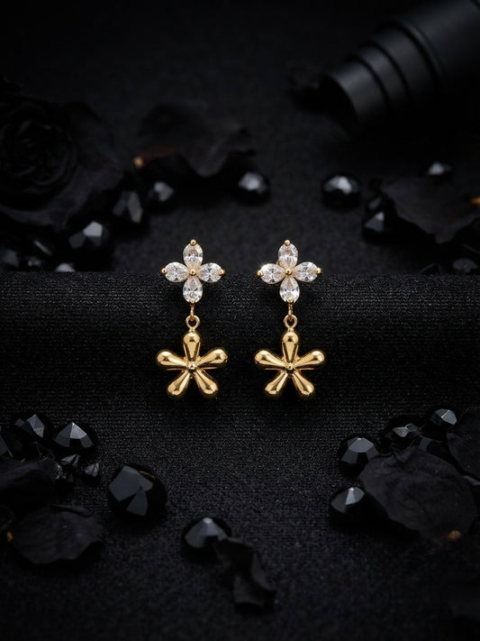 Crystal flower and gold charm earrings.
