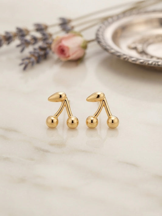 Modern musical symbol gold stud earrings.