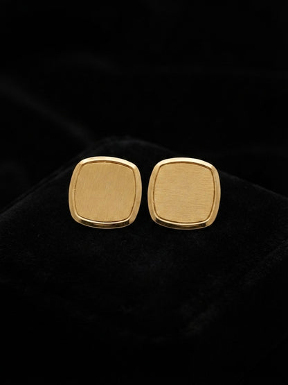 Modern minimalist brushed square studs.