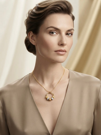 Modern gold charm ring pendant necklace.