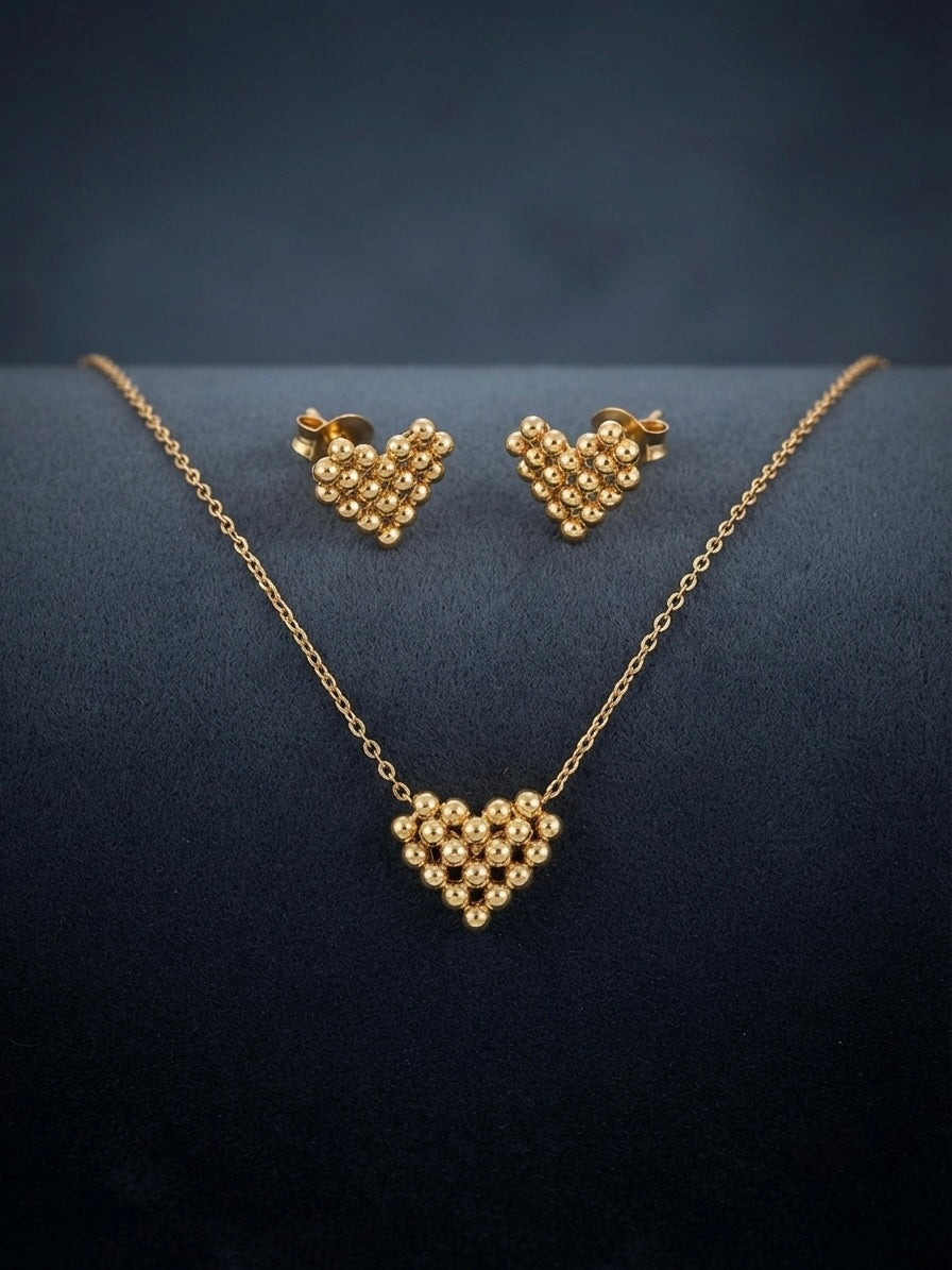 Textured gold beaded heart necklace and studs.