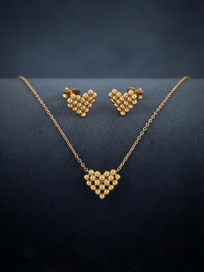 Textured gold beaded heart necklace and studs.