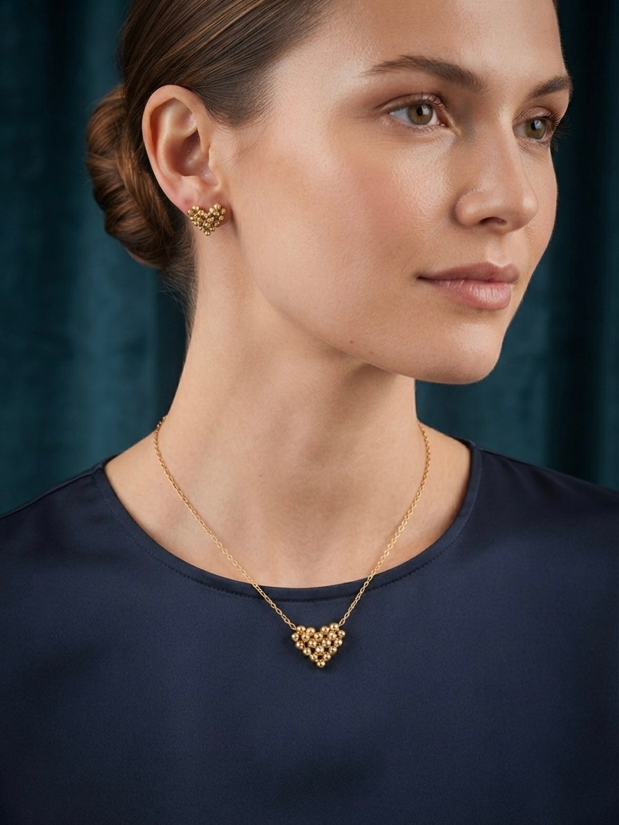 Textured gold beaded heart necklace and studs.