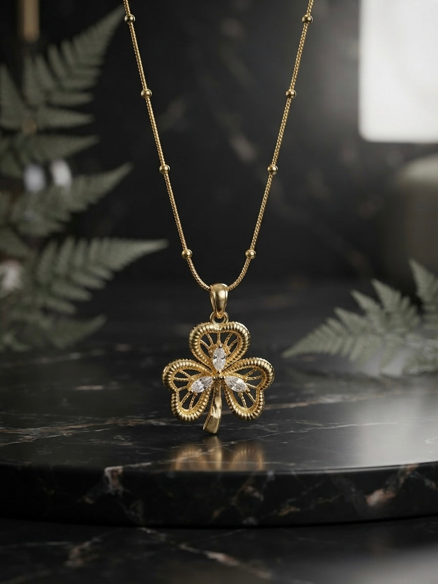 Filigree three leaf clover pendant gold necklace.