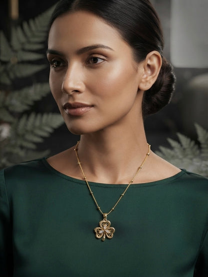 Filigree three leaf clover pendant gold necklace.