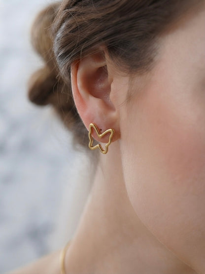 Minimalist hollow butterfly pendant and earring set.